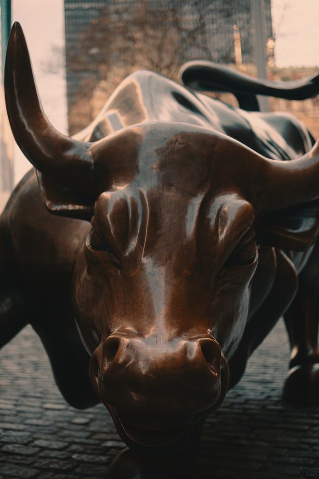 photo of the bull in front of the stock exchange